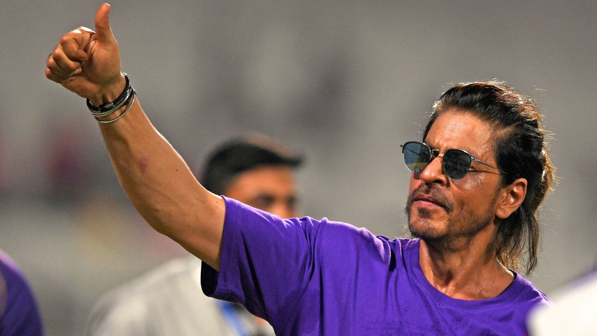 Kolkata Knight Riders (KKR) co-owner and Bollywood actor Shah Rukh Khan gestures the cowd after winning a match in IPL